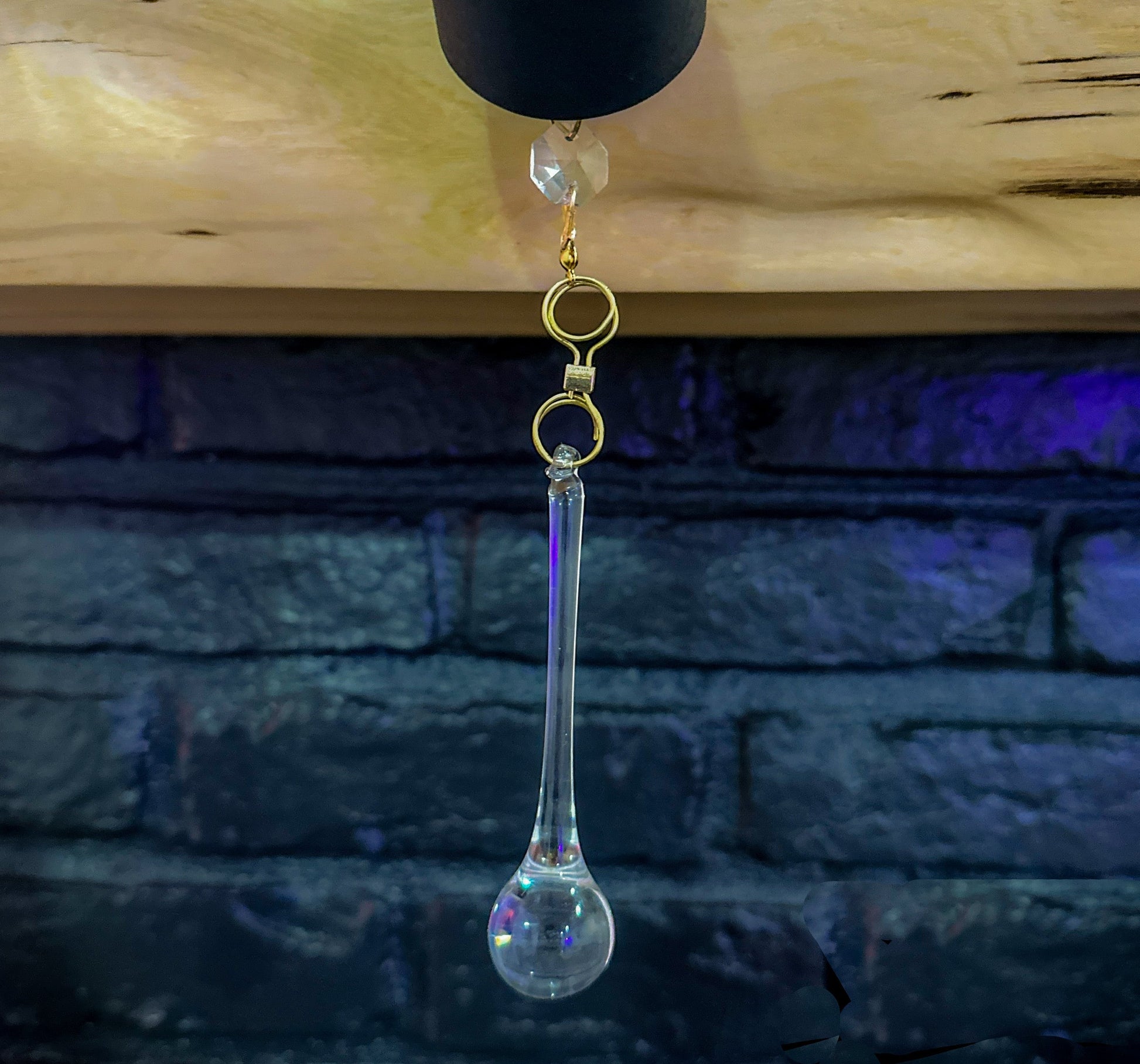 repurposed teardrop crystal light catcher.